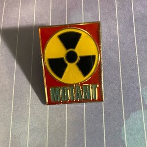 Mutant lapel pin